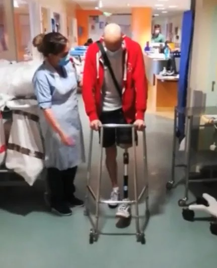 Alex Mitchell from Glasgow Scotland learning to walk-had his leg amputated after Covid Vax