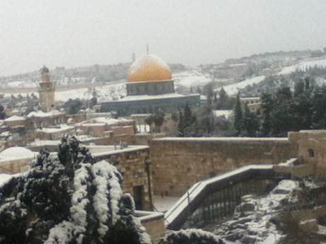 The Old City of Jerusalem, covered in Snow, looking towards the Temple Mount