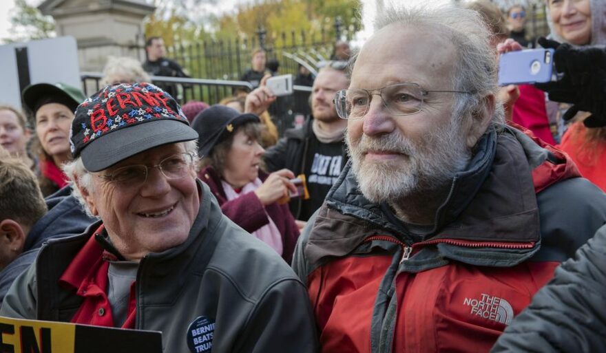 Ben Cohen, left, and Jerry Greenfield, co-founders of Ben & Jerry's ice cream, attend a protest in Washington. The Vermont-based Ben & Jerry's has always been known for promoting social causes as much as its flavors of ice cream, but few have attracted as much attention as its decision to stop selling its ice cream in the Israeli-occupied West Bank and contested east Jerusalem. Nov. 8, 2019 (AP Photo/Patrick Semansky, File) 