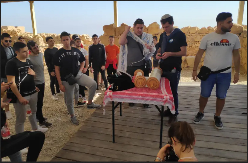  A group of French Jewish students visiting Israel with Israel Experience pray on top of Masada. (photo credit: Courtesy)