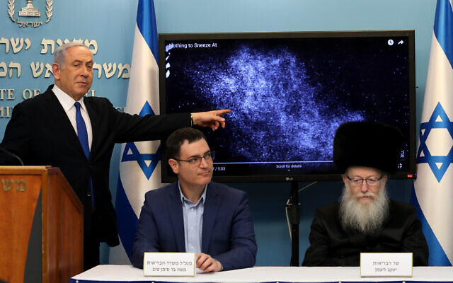 Israeli prime minister Benjamin Netanyahu with Health minister Yaakov Litzman and Health Ministry General Manager Moshe Bar Siman Tov at a press conference about the coronavirus COVID-19, at the Prime Ministers office in Jerusalem on March 11, 2020. Photo by Flash90