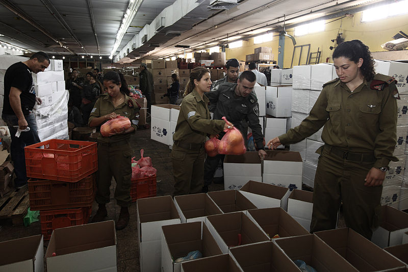 The IDF helping with Pesach Food Boxes for the poor.