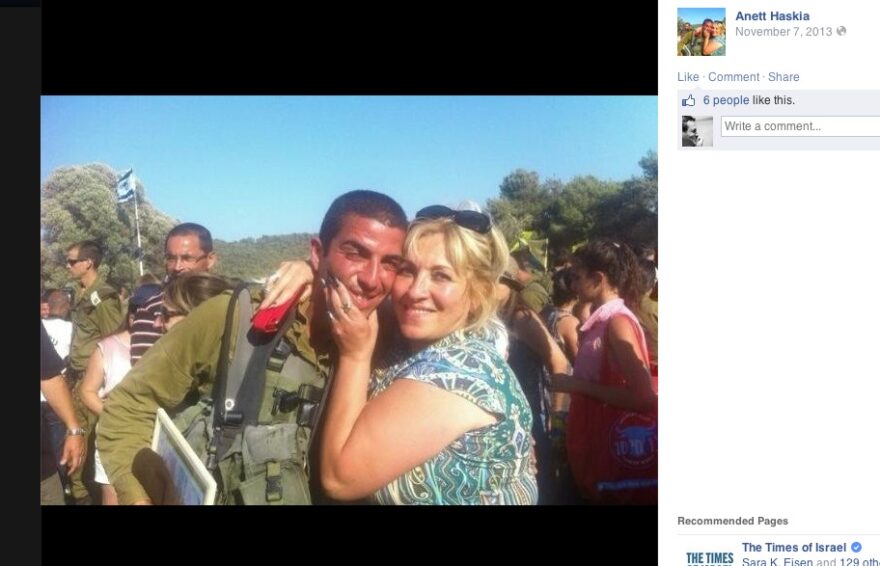 LOVE FOR SON, AND FOR COUNTRY: Arab Israeli mother Anett Haskia with son Hussam, one of her three children (including a daughter) who are serving in the IDF. All three are in the photo below. She encourages Israel’s soldiers to “keep fighting in Gaza until total victory.” (screenshots: Facebook)