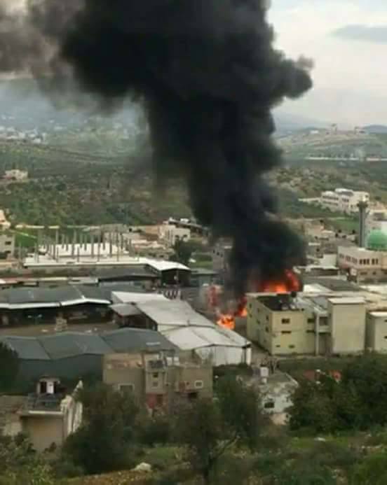 Palestinian rioters set own factory on fire Qusra-FB 1