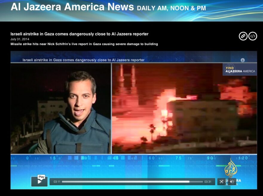ABRACADABRA: Nick Schifrin of Al Jazeera America witnessed an Israeli air strike (right) on a building behind him. He explained to his viewers that “we’ve seen a lot” of Hamas rockets “embedded really within civilian neighborhoods, in residential neighborhoods.” But Nick’s report seems to have been embedded into the network’s trash bin.