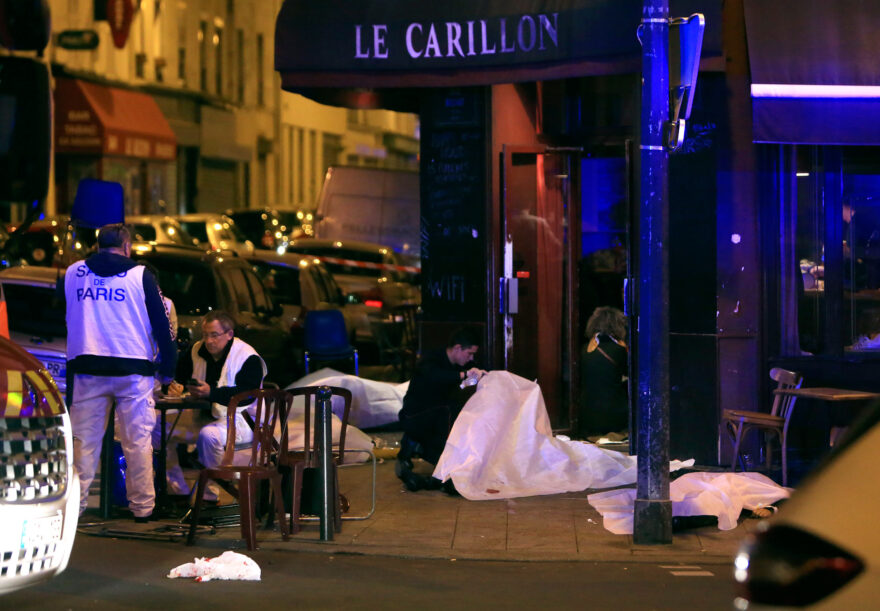 Victims lay on the pavement outside a restaurant in Paris on Friday, Nov. 13.