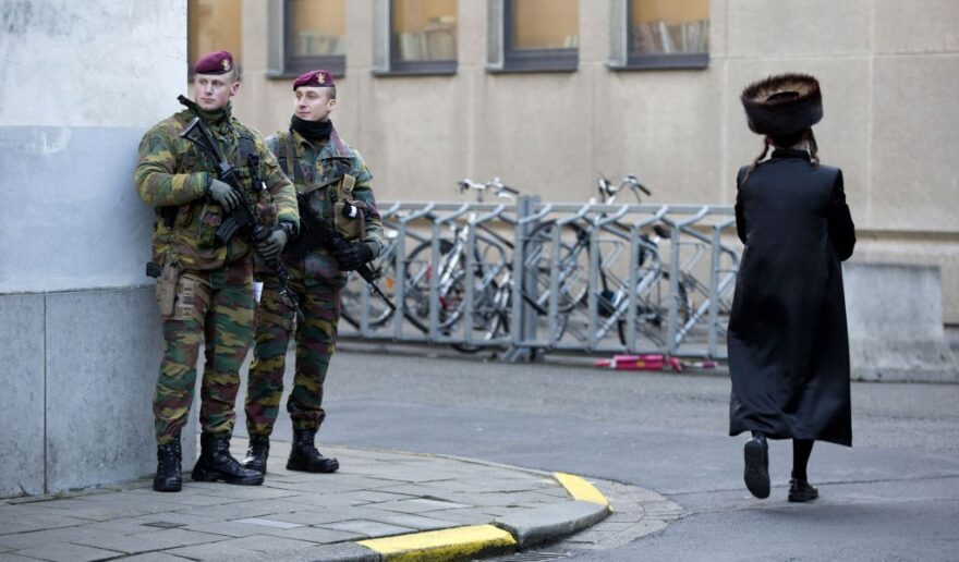 Belgian para-commandos patrol near a synagogue in the center of Antwerp, Belgium, on Saturday, Jan. 17, 2015. (photo credit: AP/Virginia Mayo)