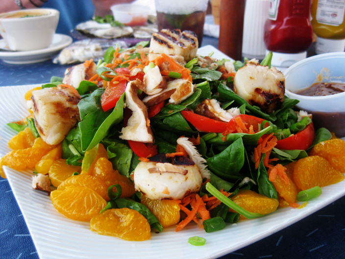 Spinach salad with various ingredients