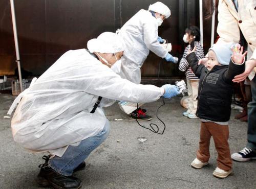 Children being checked for radiation from Fukushima