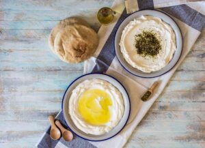 Labneh is a thick, tangy strained yogurt that's delicious with cucumber and tomato salad, 