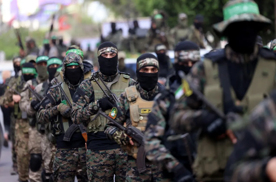 Members of the Al-Qassam brigades, the armed wing of Hamas, march in Gaza in a file photo. Photo: AFP / Emmanuel Dunand