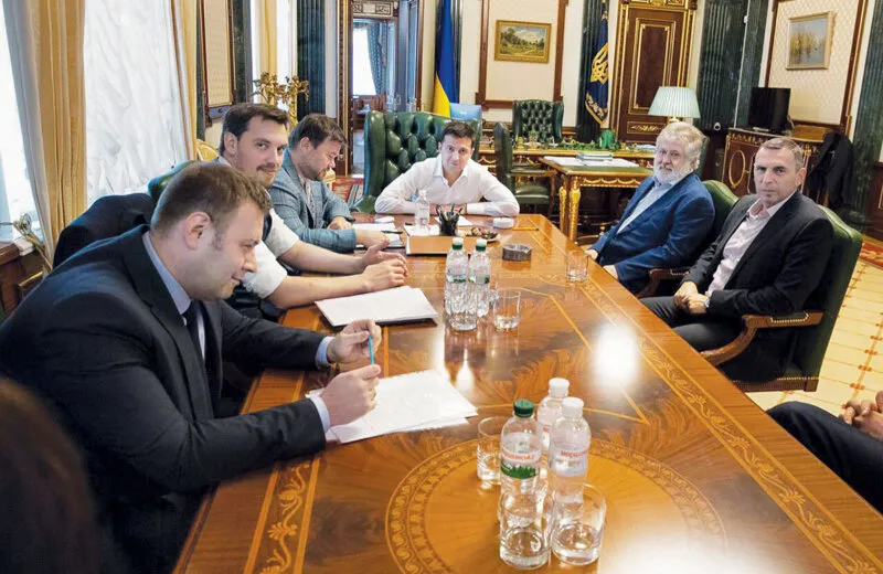 President Zelensky (C) meets with billionaire oligarch and business associate Ihor Kolomoisky on September 10, 2019