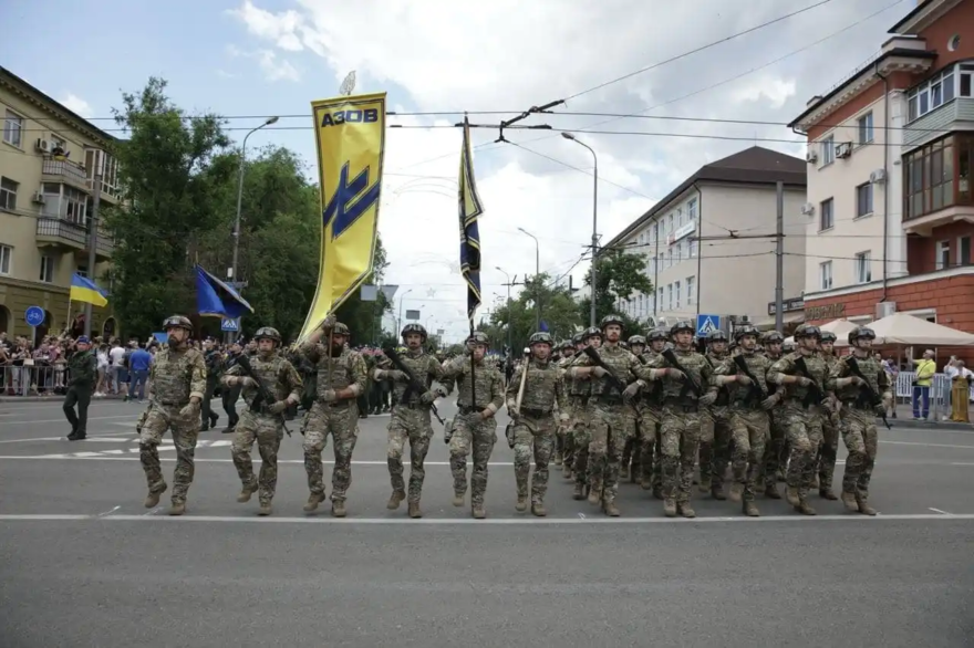 The Azov Battalion marches with Nazi-inspired Wolfsangel flags in Mariupol, August 2020