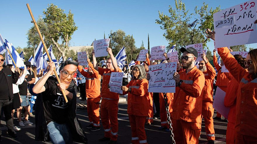 Im Tirtzu street theater Protesters perform street theater. Photo by David Isaac.