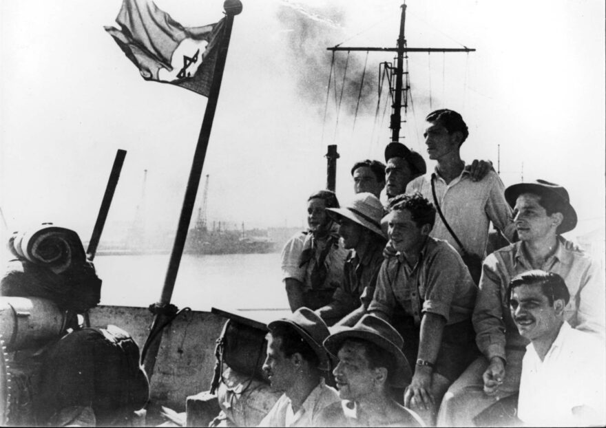Jewish immigrants on the deck of the Pan York on the day they arrived in Israel, August 14, 1948. (Yad Vashem Archives)