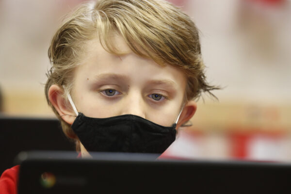 A student wears a mask at a school in Provo, Utah, on Feb. 10, 2021. (George Frey/Getty Images)