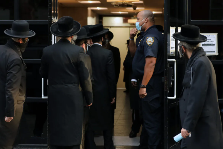 People congregate outside of the Congregation Yetev Lev D’Satmar synagogue in Williamsburg, Brooklyn, New York City, on Oct. 19, 2020. (Spencer Platt/Getty Images)