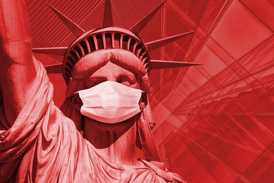 The Statue of Liberty wearing a COVID mask