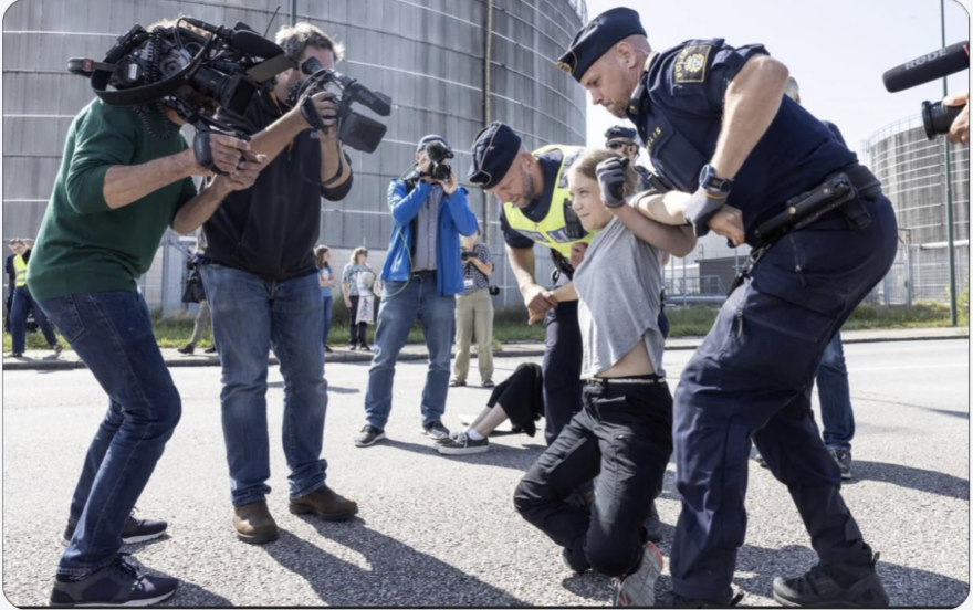 Greta Thunberg Poses for the Cameras Amid Arrest