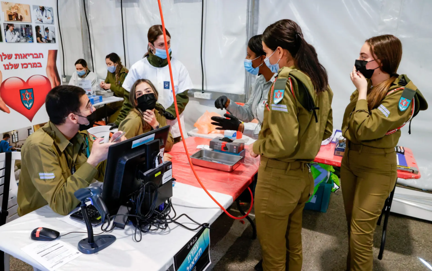Military personnel receive a dose of the COVID-19 vaccine at a military base in Rishon Lezion, Israel, on Dec. 28, 2020. (Jack Guez/AFP via Getty Images)