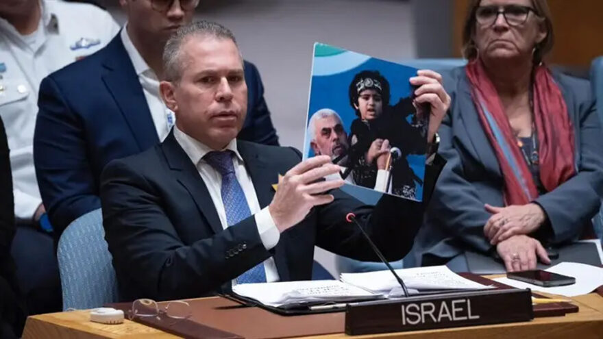 Erdan shows photo of Hamas leader with child