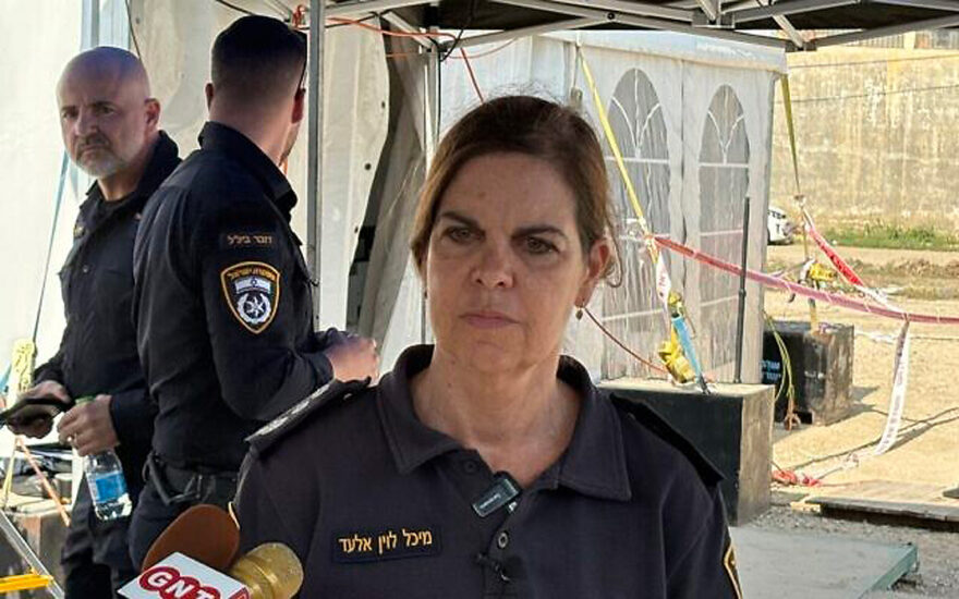 Forensic identification lead, police commander Michal Levin Elad, at the makeshift mass casualty morgue at Shura Base, October 31, 2023. (Carrie Keller-Lynn/Times of Israel)