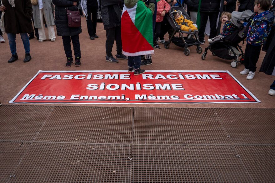 A banner by the collectif Palestine 69 with the words “Fascism, Racism, Zionism: Same Enemy, Same Fight,” using 50-year-old terminology begun by the United Nations. The cross-party call to bring together political parties, associations and trade unions against racism and push for equal rights for all took place at a demonstration in Lyon, France, on March 22, 2025. Photo by Antoine Boureau/Hans Lucas/ Hans Lucas/AFP via Getty Images.