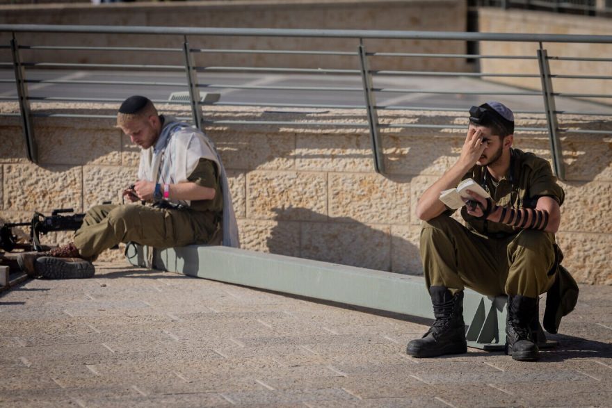 Ultra-Orthodox Jewish soldiers from the Hasmonean Brigade take part in a beret march after completing seven months of basic and advanced training, at the Western Wall in Jerusalem’s Old city on Aug. 6, 2025. Photo by Chaim Goldberg/Flash90.
