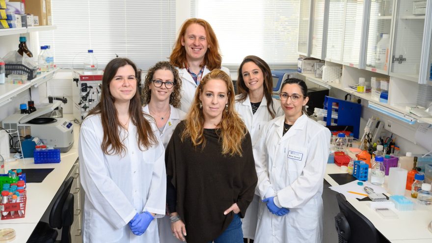 Prof. Yifat Merbl (center) and her colleagues in the Department of Systems Immunology at the Weizmann Institute of Science in Rehovot, 2025. Credit: Weizmann Institute of Science.