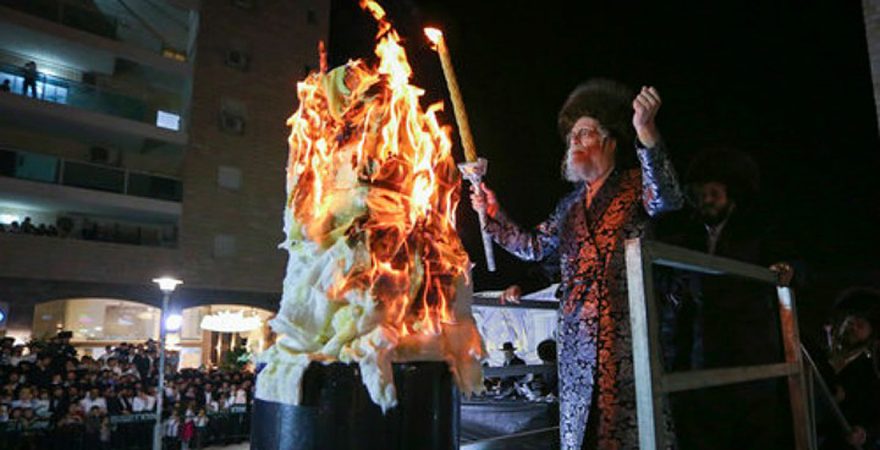 Haredi Jews watch the lighting of a bonfire in Beit Shemesh, near Jerusalem, for Lag B’Omer May 13, 2017. Photo: Yaakov Lederman/Flash90.