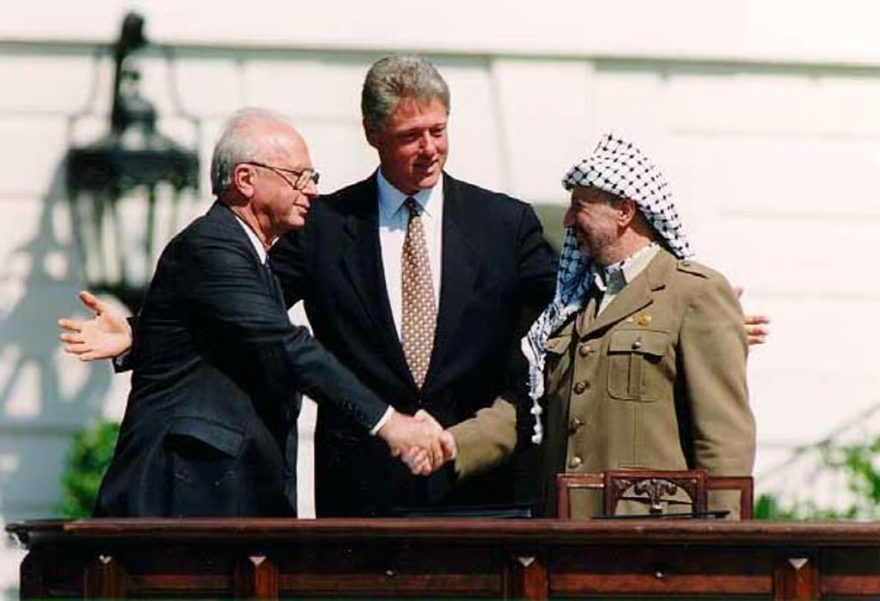 President Clinton, Yitzhak Rabin, and Yasir Arafat at the signing ceremony for the Oslo Accord, September 13, 1993. (William J. Clinton Presidential Library)